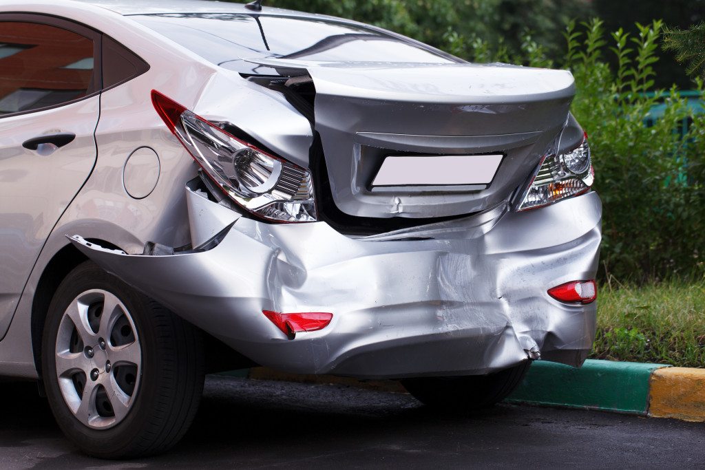 damaged rear end of car from accident