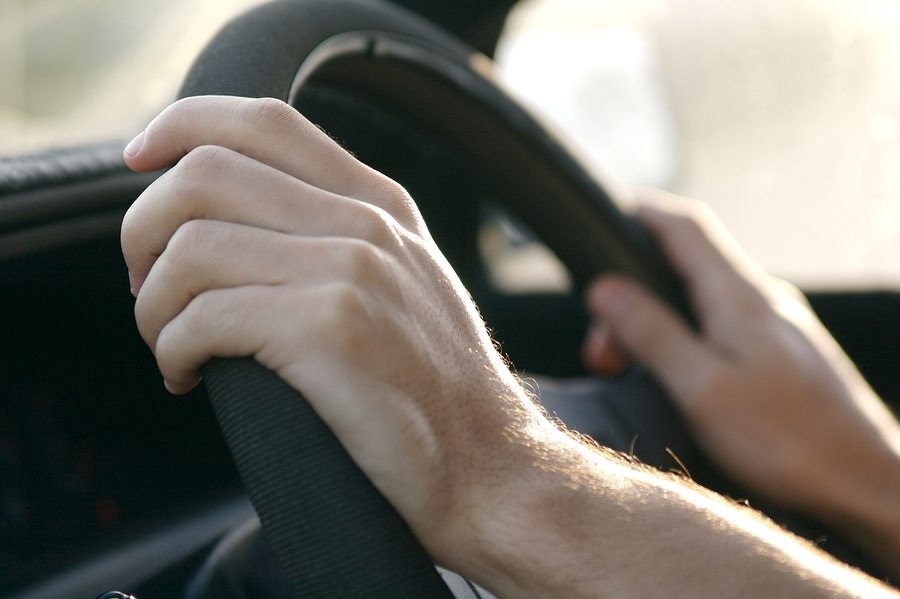 closeup driving a car